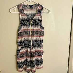 3/$15. Rue 21 woman’s jumpsuit short elephant floral print